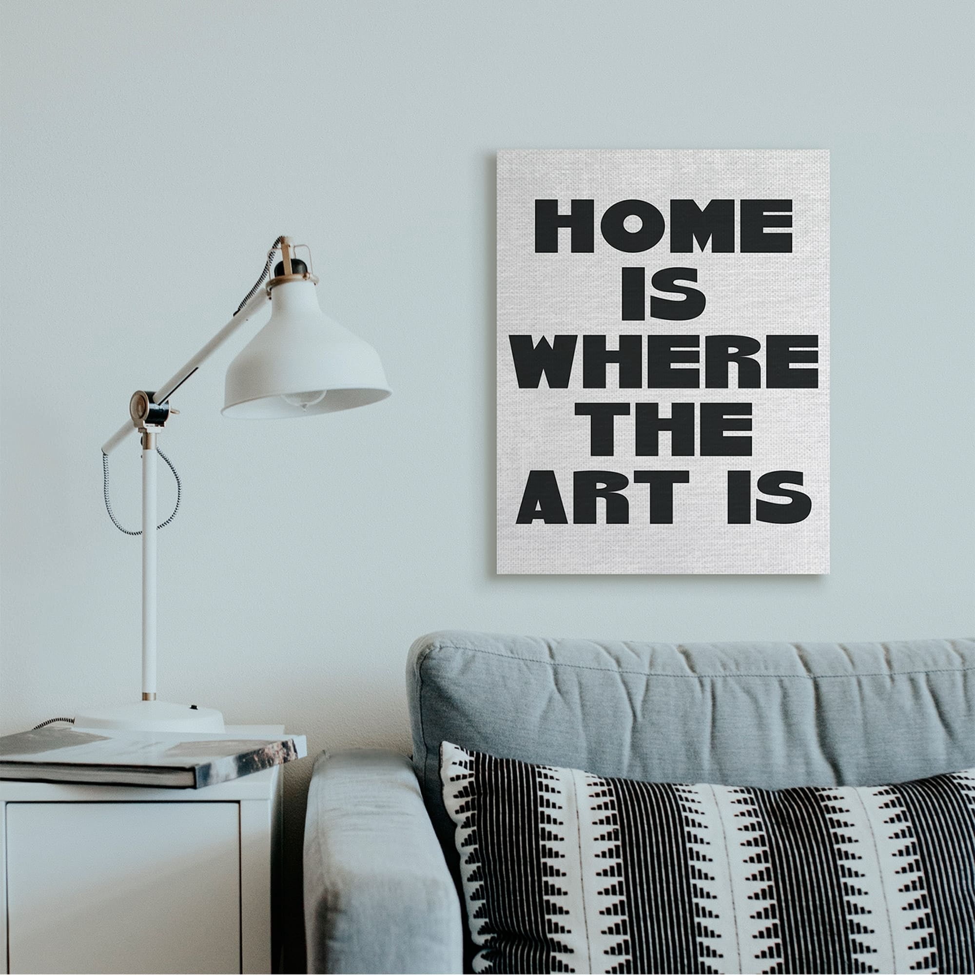 Stupell Industries Home Is Where Art Is Phrase Minimal Black White Canvas Wall Art by Daphne Polselli