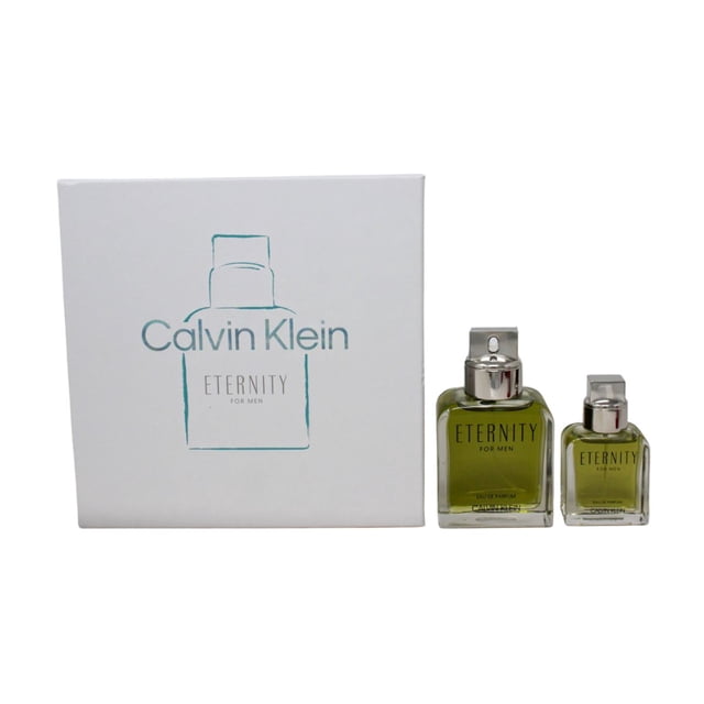calvin klein eternity edp 2 pz para hombre set con estuche blanco y dos frascos rectangulares verde oliva; vista frontal centrada, botella grande con atomizador y botella pequeña de viaje con tapas plateadas, fragancia aromática fougère para hombre visible en etiqueta.