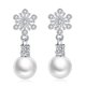 thumbnail image 1 of Pendientes colgantes de perlas blancas para mujer, aretes llamativos con forma de bola, cadena y borlas, 1 of 7