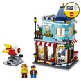 thumbnail image 4 of LEGO 31105 Creator 3-en-1 Adosada Juguetería - Pastelería - Set de construcción de floristerías, con flores y un paseo en cohete para niños de 8+ años, 4 of 8