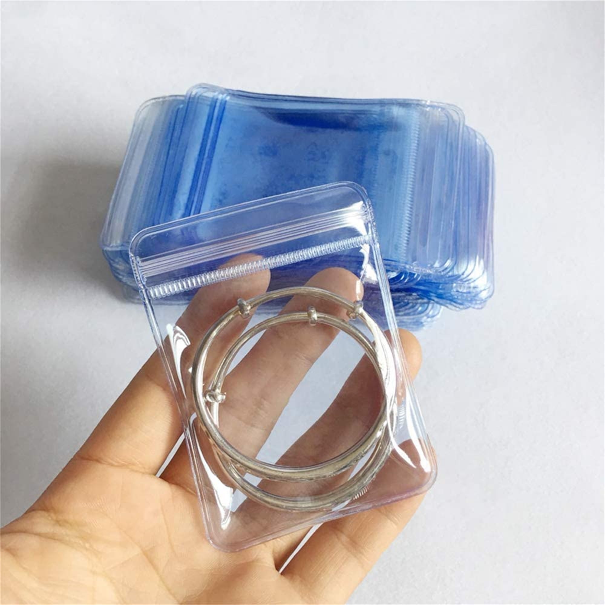  PVC Clear Anti Oxidation Jewelry Zipper Bag 100Pcs Anti Tarnish  Transparent Jewelry Storage Bags Book Small Ziplock Bags Jewelry  Organization (Pale Blue 1.97X2.76 Inch) : Clothing, Shoes & Jewelry