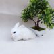thumbnail image 1 of Conejito de simulación Hesroicy, lindo conejo de peluche blanco coleccionable de piel sintética, decoración de Pascua para el hogar, 1 of 8