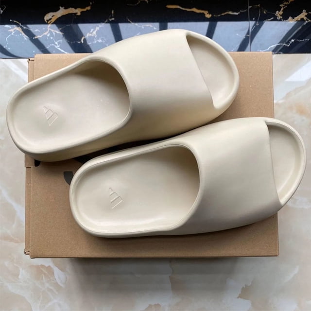 Zapatillas De Coco YEEZY Hombres Y Mujeres Amantes De La Playa Primavera Y Verano slide wear Suelas Gruesas Para Evitar El Deslizamiento