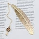 thumbnail image 2 of Marcador en forma de pluma de metal 11,4 * 2,3 cm, llave creativa de marcador retro dorado, 2 of 5