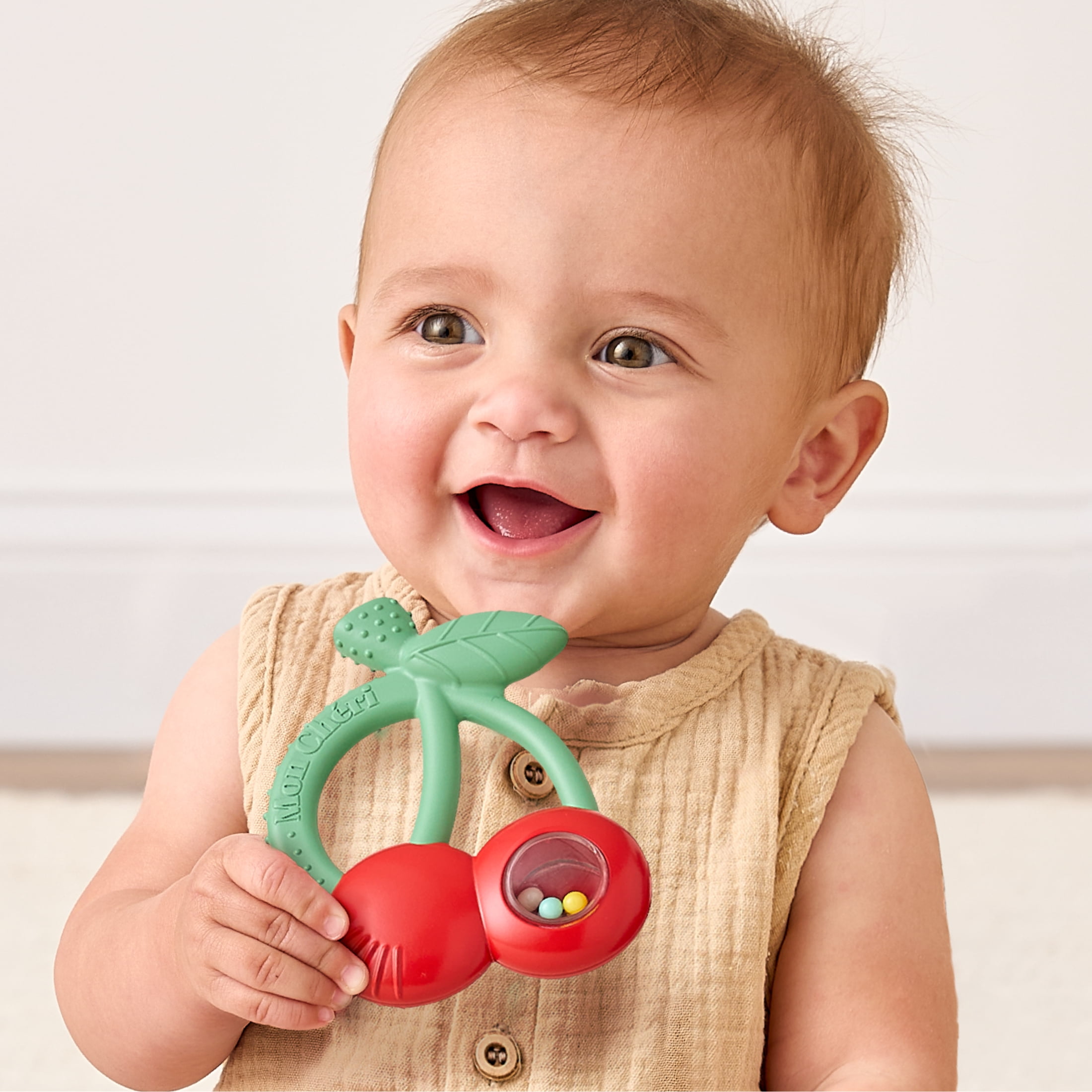 Bitzy Shake™ Cherries silicone teether with rattle