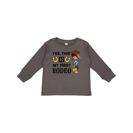 

Inktastic Yes This is My First Rodeo- Cowboy in Hat and Boots Gift Toddler Boy Girl Long Sleeve T-Shirt