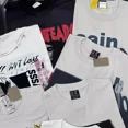 thumbnail image 4 of Camiseta holgada con estampado de letras de estilo americano de verano de Saintmichael para hombres y mujeres, manga corta, algodón de calle, 4 of 4