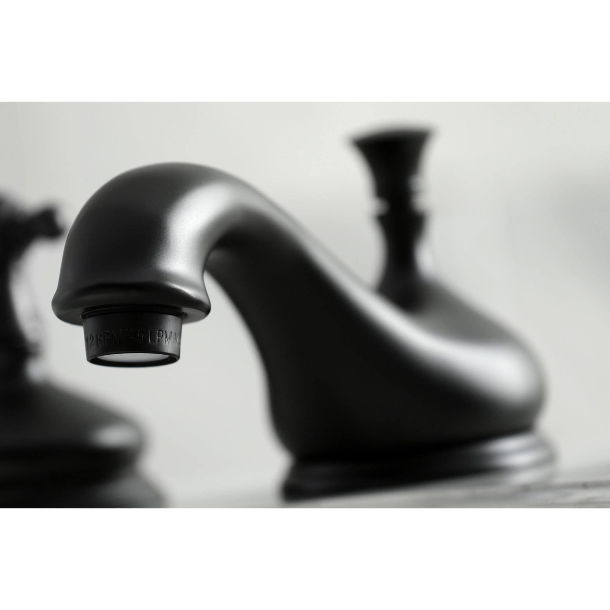 Kingston Brass KS1160PL Heritage Two-Handle 3-Hole Deck Mount Widespread Bathroom Faucet with Brass Pop-Up in Matte Black