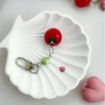 thumbnail image 5 of Multipurpose Charm Tomato with Green Leaves and Girl Figures Keyring Fashion Accessory for Trendy Women Ladies, 5 of 9