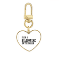 thumbnail image 1 of Soy un millonario en el sueño Llavero de metal en forma de corazón dorado, 1 of 3