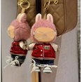 thumbnail image 4 of Conjunto de atuendo para muñeca de 17 cm: chaqueta de béisbol, pantalones de mezclilla y zapatos, 4 of 5