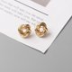 thumbnail image 2 of Pendientes pequeños de Metal para mujer, aretes redondos retorcidos de Color dorado, pequeños e inusuales, joyería de moda, 2 of 4
