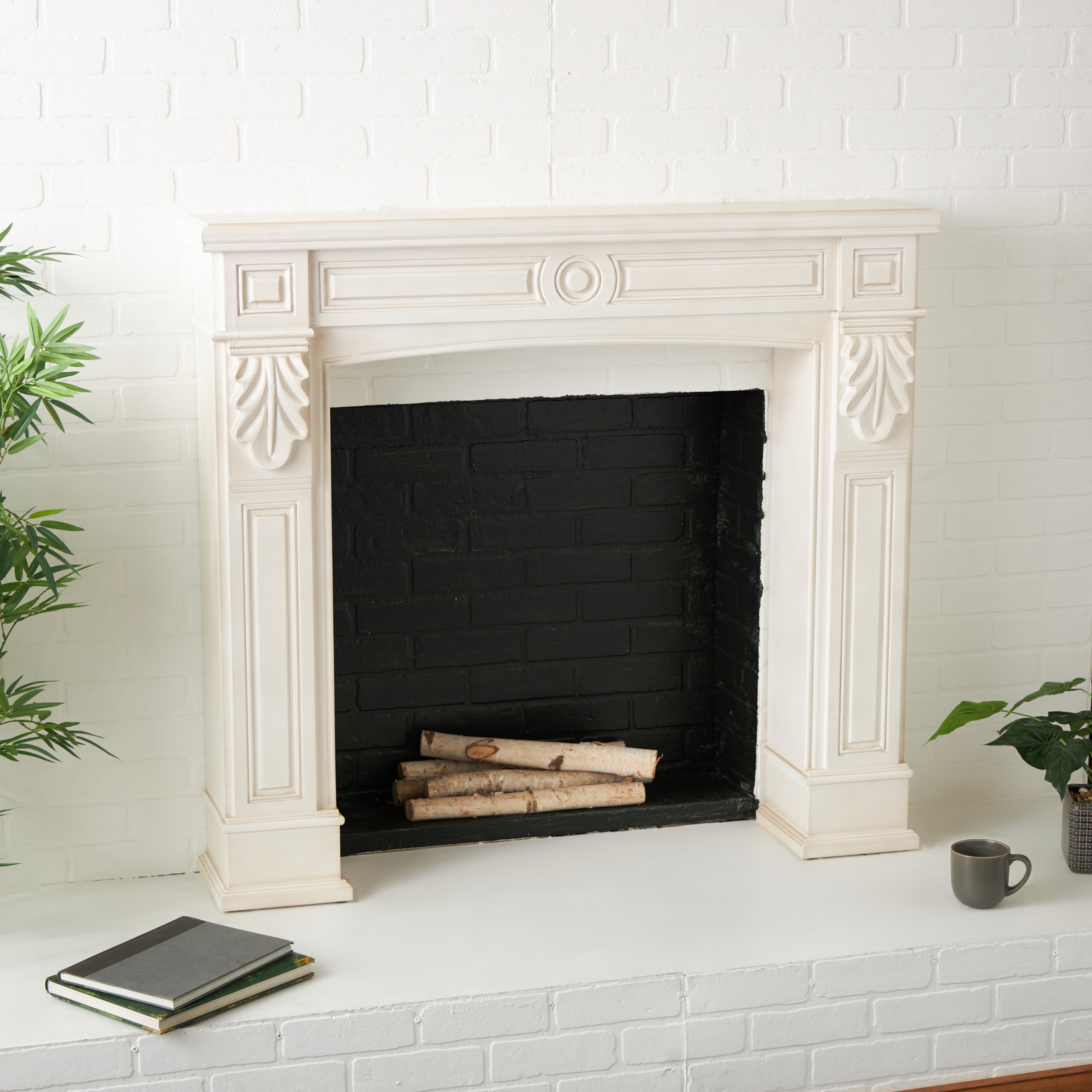 DecMode 47" x 43" Wooden White Freestanding Surround Fireplace Mantle with Leaf Accents