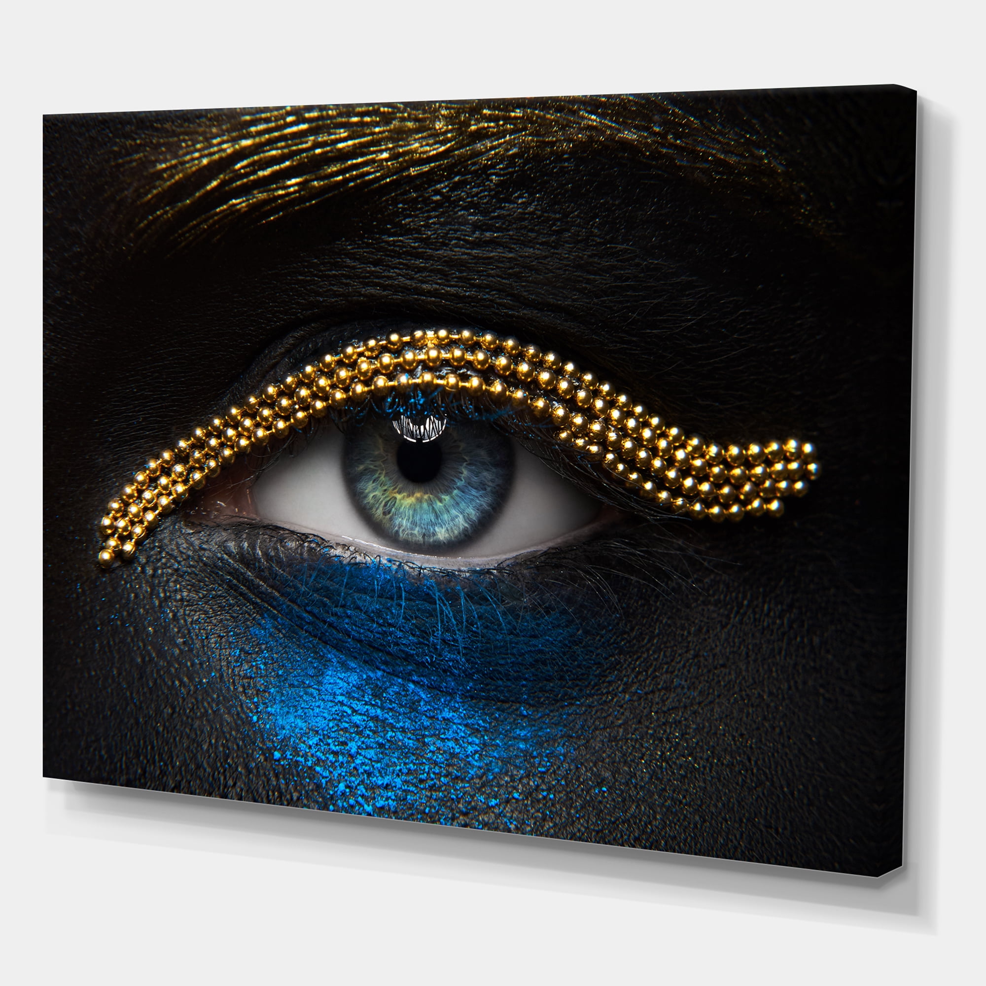Designart ' Girl Eyes With Gold Chain and Blue Pigment ' Modern Canvas Wall Art Print