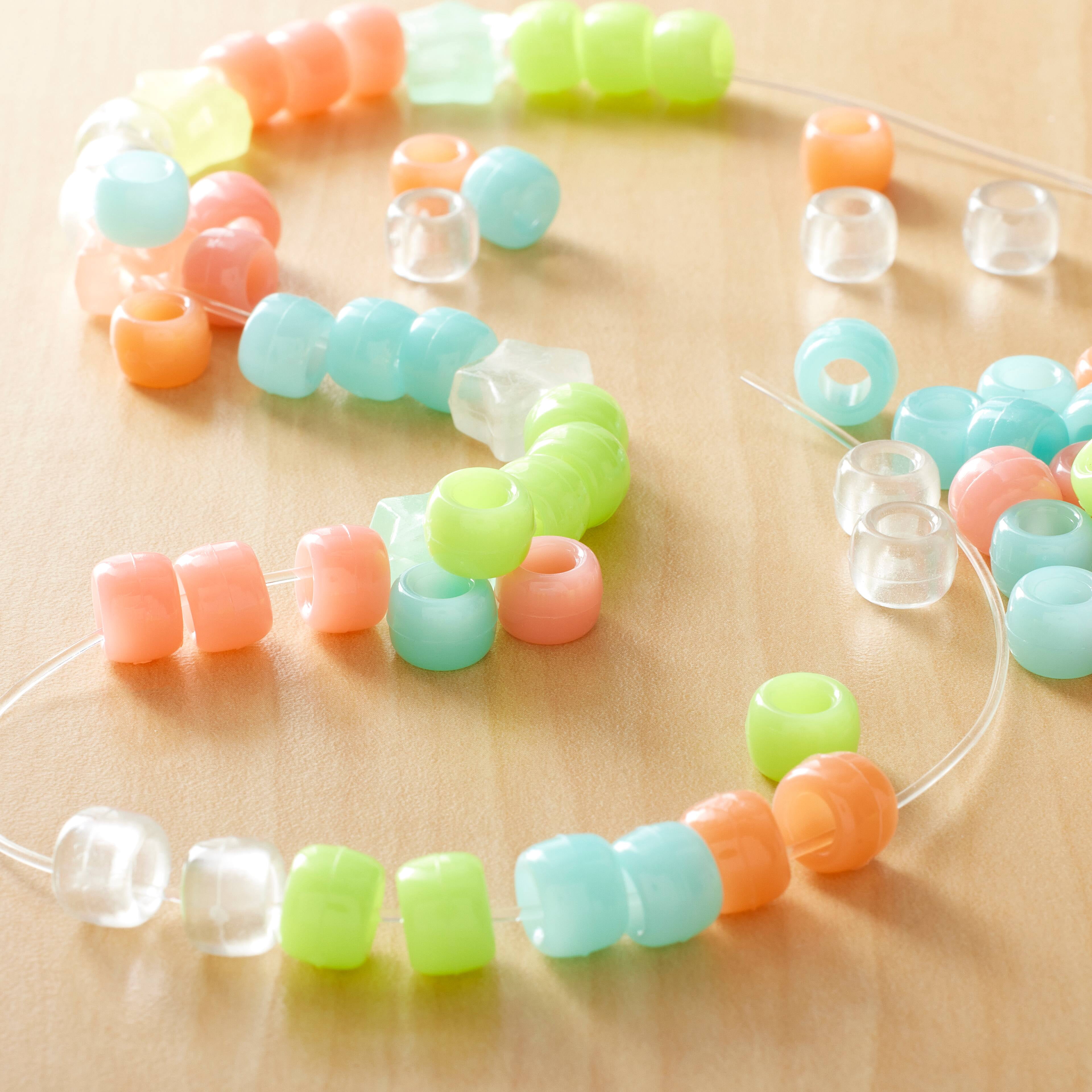 12 Packs: 280 ct. (3,360 total) Glow in the Dark Pony Beads by Creatology - 6mm x 9mm