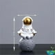 thumbnail image 1 of Material de resina, adornos de astronautas, soporte Universal para teléfono móvil, regalo de Navidad, juguetes, decoración de escritorio de oficina en casa, regalos de cumpleaños, 1 of 4