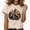 1-Apricot, variant on Cozymy Pumpkin Bow Halloween Women's Washed Crewneck Short Sleeve Graphic Tee