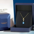 thumbnail image 5 of Gem Stone King 14K Yellow Gold Swiss Blue Topaz and Lab Grown Diamond Pendant Necklace for Women | 1.00 Cttw | Gemstone November Birthstone | Emerald Cut 7X5MM | With 18 inch Chain, 5 of 6