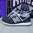 thumbnail image 1 of Size 9.5 - Men's New Balance 574 Athletic Shoes Black, 1 of 6