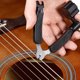 thumbnail image 3 of Enrolladores de cuerdas de guitarra 3 en 1, herramienta para guitarra, cortador de alambre, cortador de cuerdas y Br, 3 of 5