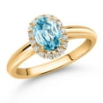 thumbnail image 2 of Gem Stone King 10K Yellow Gold Blue Zircon and White Lab Grown Diamond Halo Engagement Ring for Women (1.38 Cttw, Gemstone December Birthstone, Oval 7X5MM, Size 8), 2 of 4