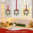 thumbnail image 5 of Guvpev 4 Pcs Small Mini Christmas Wreaths for Kitchen Cabinets, Frosted Cedar Christmas Candle Rings Wreath for Pillars Kitchen Cabinet Windows Centerpieces Table Decorations, 5 of 6