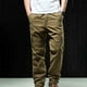 thumbnail image 1 of Pantalones largos de moda para hombre, casuales, de color sólido, con bolsillos y cremallera, cintura elástica, de poliéster., 1 of 4