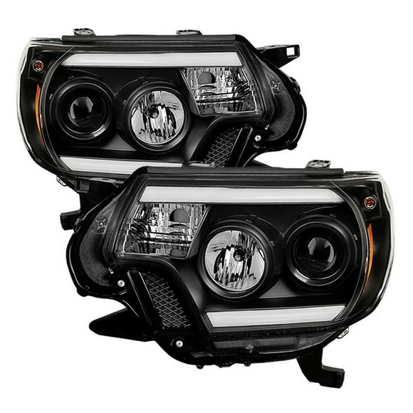 Fits 2012-2015 Toyota Tacoma Spyder Automotive Headlight Assembly 5081711 Halogen Bulb; Projector Beam With Bar Style Daytime Running Light; Clear Bulb; Clear Lens; Black Housing; Set of 2