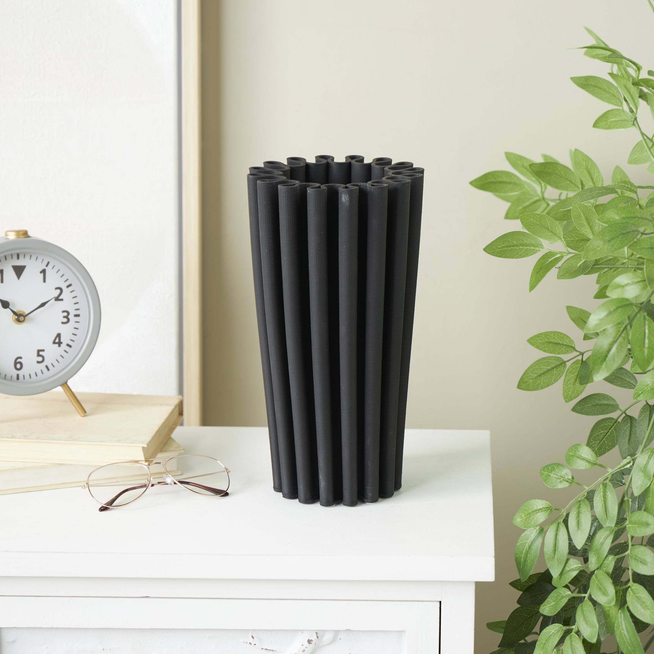 DecMode 12" Abstract Dimensional Ribbed Black Ceramic Vase with Cylindrical Ridges