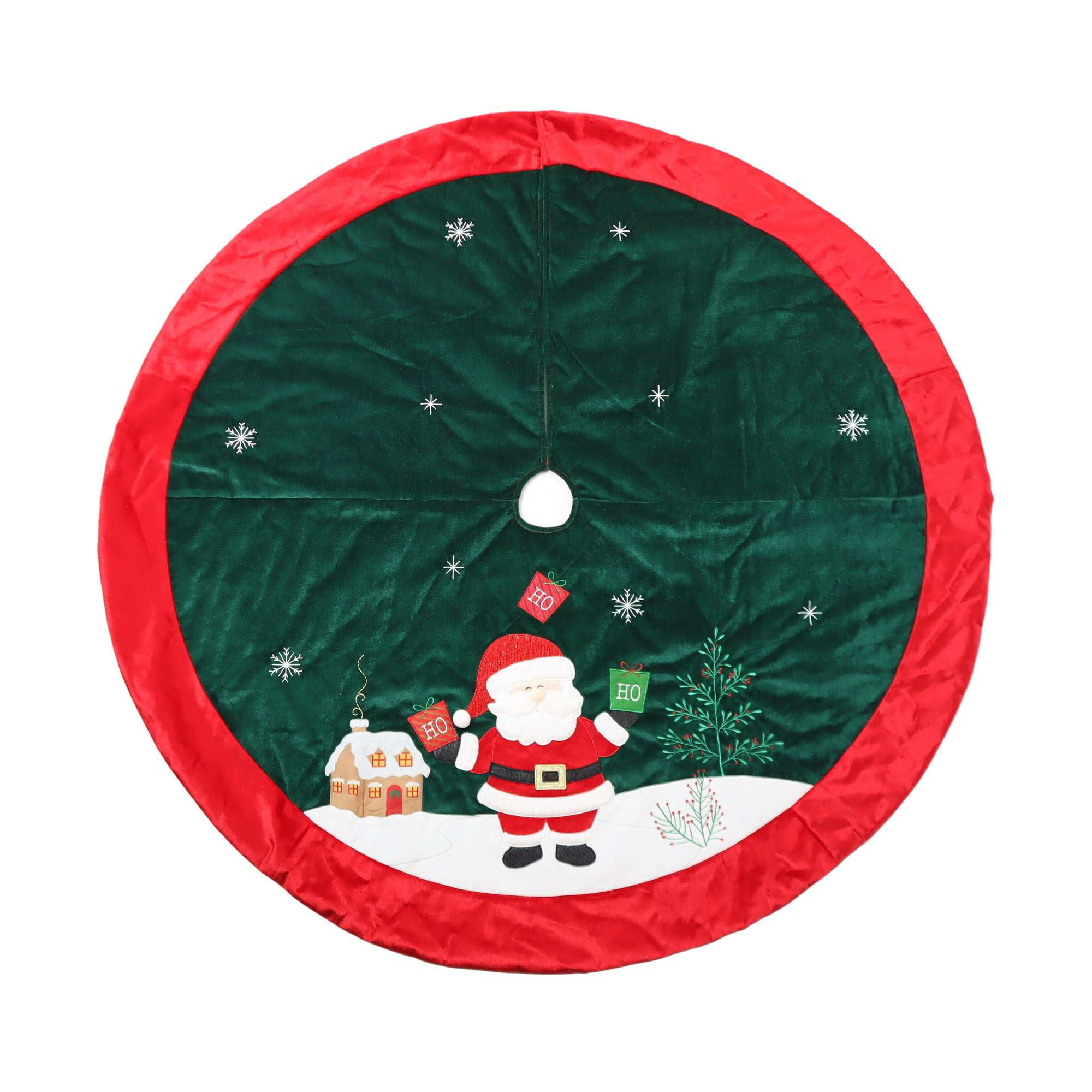 Holiday Time Velvet Santa Tree Skirt, 48 in, Multi-colour, Christmas Tree Skirt,Velvet material,base dark green color,trim red color,Santa is standing on the snow ground,holding green and red gift bags with “HO” embroidered on it.There are flowers on the snow ground,a house on back of the Santa.