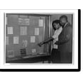 thumbnail image 2 of Historic Framed Print, [Two black students at National Youth Administration library exhibit], 17-7/8" x 21-7/8", 2 of 9
