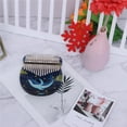thumbnail image 3 of Pulgar Piano Exquisito Dedo Piano Acrílico Mano Instrumento Musical Con Martillo Y Bolsa De Almacenamiento Para Niños Adultos Principiantes 17 Teclas Kearding EL014431-02, 3 of 6