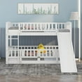 thumbnail image 2 of Harper & Bright Designs Twin Over Twin Low Bunk Bed with Slide Fence and Ladder, Multifunctional Wooden Floor Bunk Bed Frame with Small Door for Boys Girls, No Box Spring Needed, White, 2 of 11
