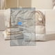 thumbnail image 5 of Fiudx Bolsa de Almacenamiento Al Vacío, Organizador de Ropa Que Ahorra Espacio, a Prueba de Insectos y Humedad, Ideal para Armarios, Maletas y Ropa de Cama, Color Azul, 80 X 60 Cm., 5 of 6