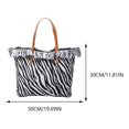 thumbnail image 3 of Bolso Hombro para Mujer Con Diario Lona Borlas (estampado Cebra), 3 of 5