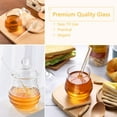 thumbnail image 2 of Rirool Clear Honey Jar with Dipper and Lid, 8.4 oz Borosilicate Glass Beehive Honey Pot Container, Stylish Honey Dispenser for Home Kitchen, Store Honey, Syrup, and More, 2 of 6