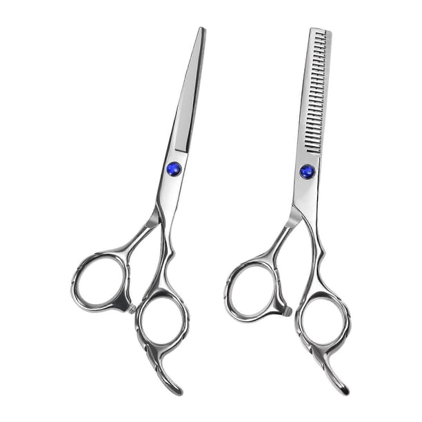 Juego de tijeras de peluquería plateadas con filo de precisión y mango ergonómico de acero inoxidable.