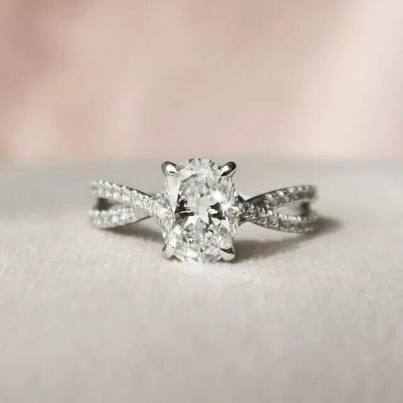 2Ct Oval Cut Lab Created Diamond Hidden Halo Twisted Ring In 14K White Gold Plated Silver