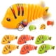 thumbnail image 1 of (Liquidación) XIANXIAN 3 piezas de juguetes de plástico con forma de pez que se mueve y se mece 2025 nuevos juguetes de peces de dibujos animados que giran 360 ° para bebés, gatos y mascotas,, 1 of 8