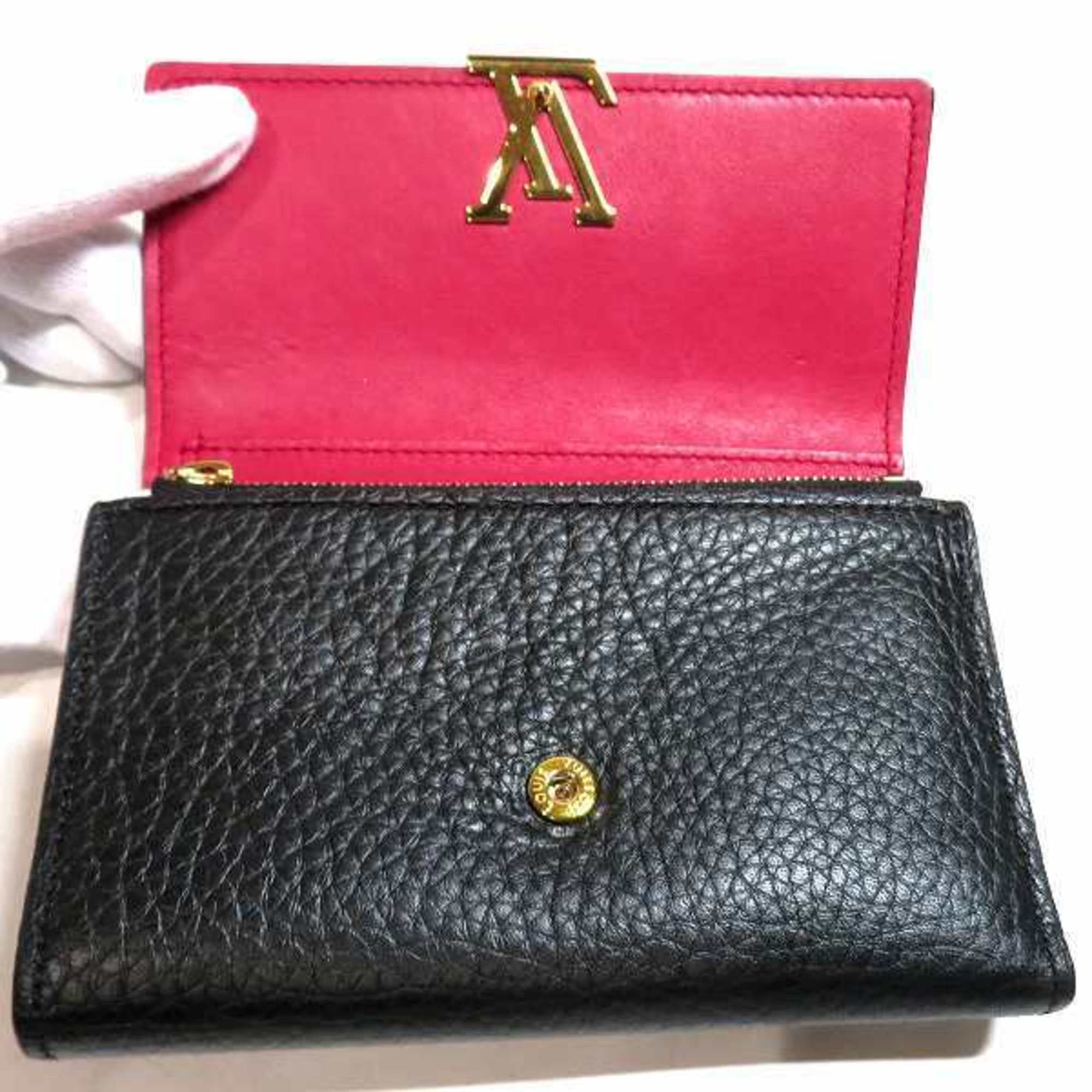 Louis Vuitton, Bags, Louis Vuitton Slender Wallet Black Taurillon Leather  Embossed 8 Credit Card Slot