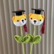 thumbnail image 2 of Ramo de graduación hecho a mano con ganchillo - Figurita de niño/niña/perro de recuerdo para graduados, profesores, amantes de las mascotas | Regalo de hilo ecológico para celebraciones académicas, 2 of 6
