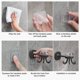 thumbnail image 4 of Estante de pared para cocina con forma de pulpo | Organizador adhesivo multigancho sin necesidad de taladrar | Ganchos giratorios de 360 grados para utensilios, toallas y llaves, 4 of 7