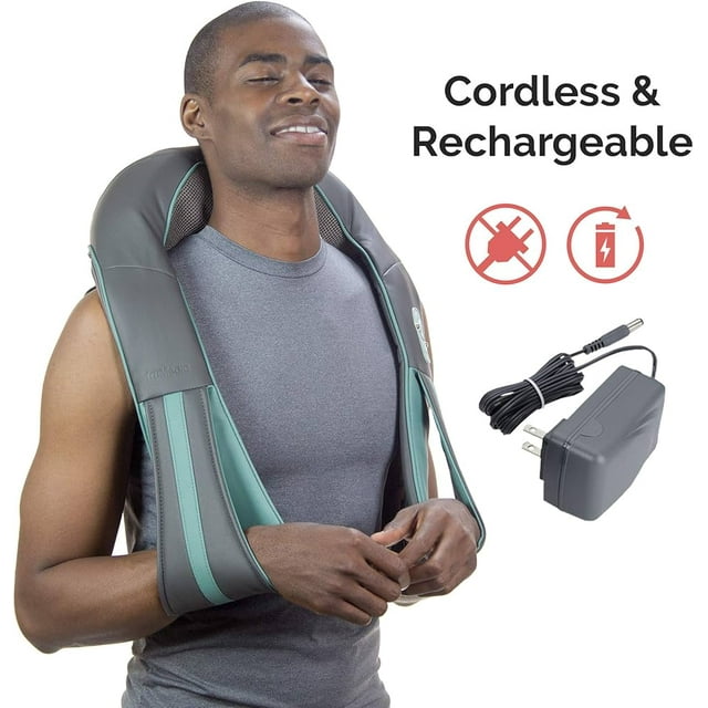 TruMedic InstaShiatsu Shoulder, Back & Neck Massager IS-3000 shown in use, draped over the shoulders of a person. The massager features a cordless and rechargeable design, with a grey and teal colour scheme. Includes a power adapter for charging.