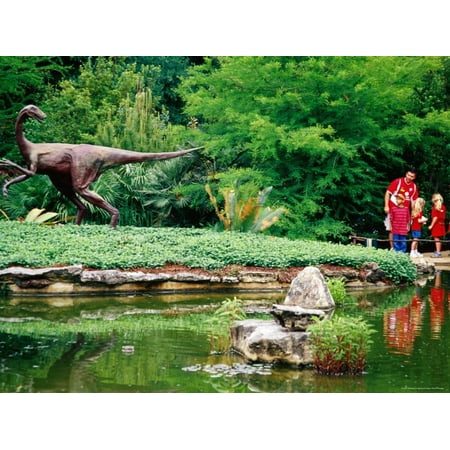 Art Sculptures Near Me Children and Adult Standing near Ornithomimus Dinosaur Sculpture, Austin, Texas Print Wall Art By Richard Cummins ()