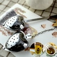 thumbnail image 1 of Infusor de Té En Forma de Corazón, Diseño de Acero Inoxidable, Fácil de Usar para Preparar Té, Mantiene Las Hojas Contenidas, Opciones de Cadena/Asa, Perfecto para Los Amantes Del Té, Tamaño, 1 of 7