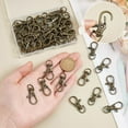 thumbnail image 3 of 50 pcs Metal Lobster Claw Clasps Swivel Lanyards Trigger Snap Hooks Strap 35x13mm for Macrame Keychain Key Rings DIY Bags and Jewelry Findings Antique Bronze DIY, 3 of 6