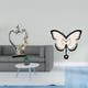 thumbnail image 2 of Estatua de pareja besándose, reloj de pared de resina acrílica, figura moderna abstracta de mariposa y flor, ideal para parejas, bodas, aniversarios,, 2 of 8