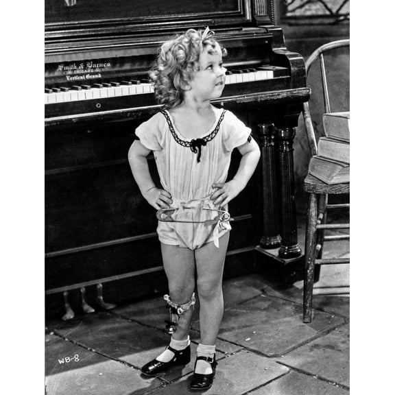 Shirley Temple wearing a Short House Dress Photo Print (24 x 30)