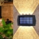 thumbnail image 1 of Focos solares para paisajes - 2 packs IP65 impermeables de luces exteriores para pared exterior, luces solares para jardín, sendero y entrada, 1 of 6