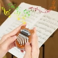 thumbnail image 4 of 1 pcs 8 Key Mini Exquisite Finger Thumb Piano Marimba Musical good accessory Pendant Gift, 4 of 9